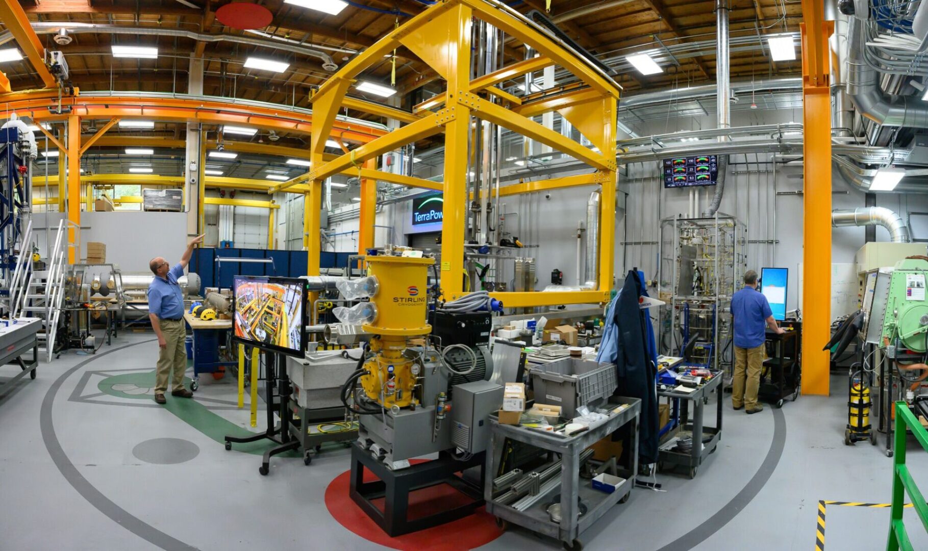 A factory with machines and workers in it