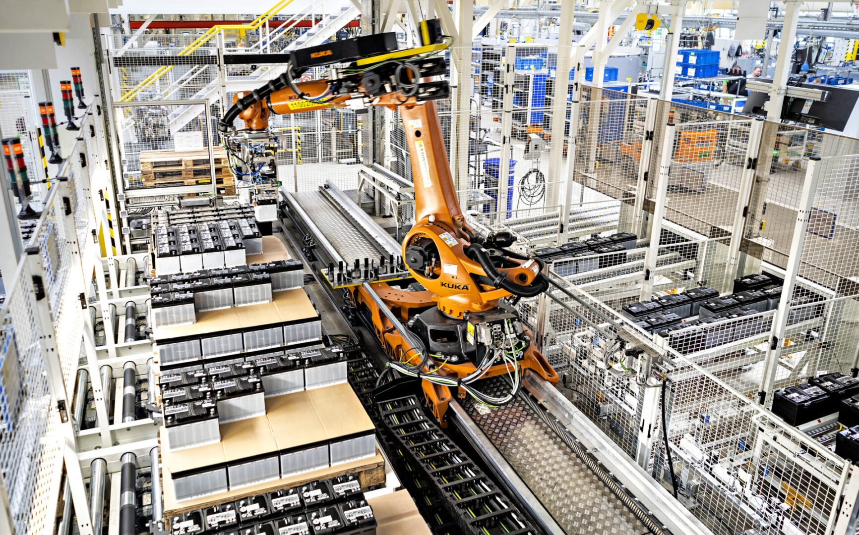 A robot is moving along the conveyor belt.