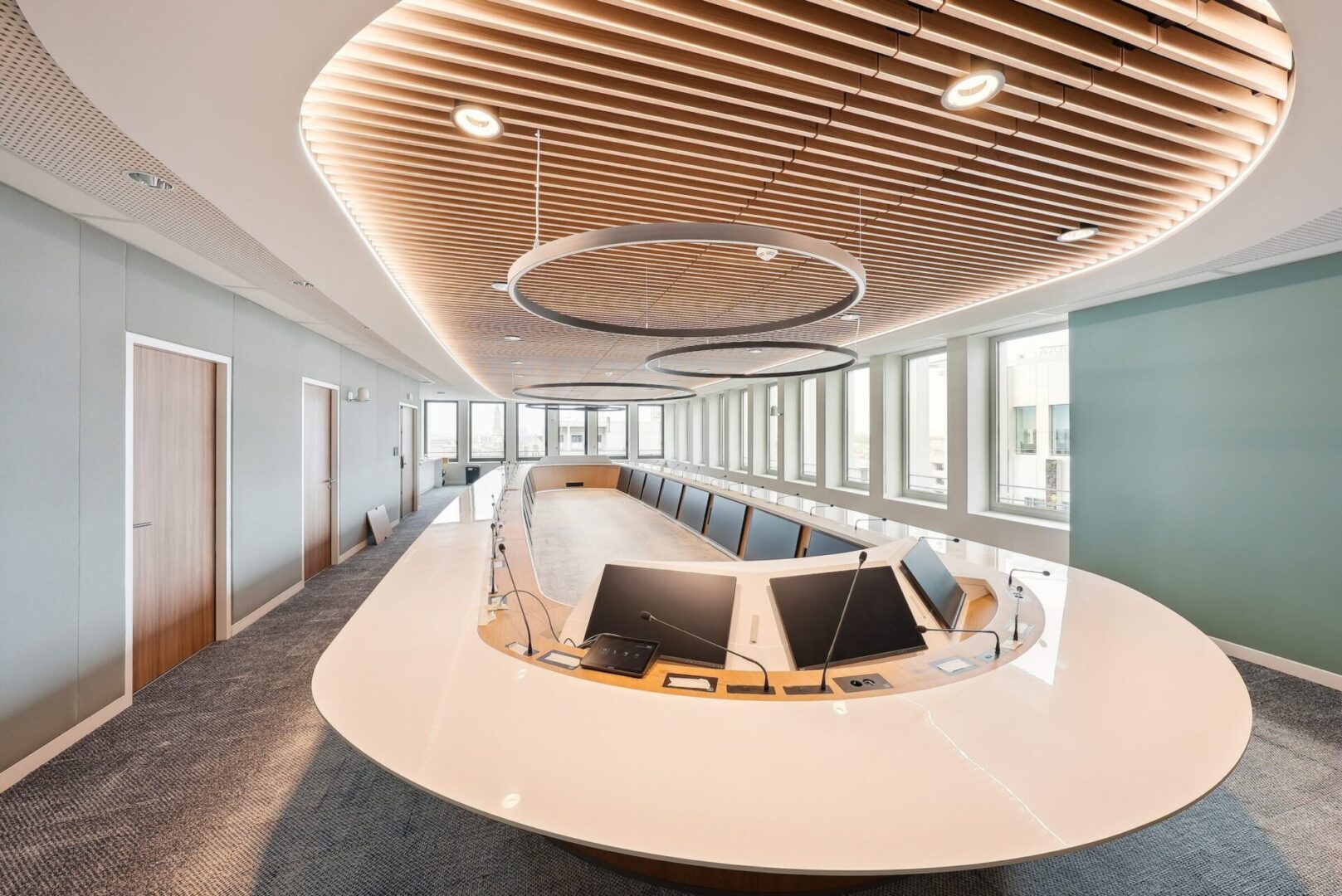 A large conference room with many chairs and tables.
